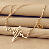 Gold colored heartbeat necklace